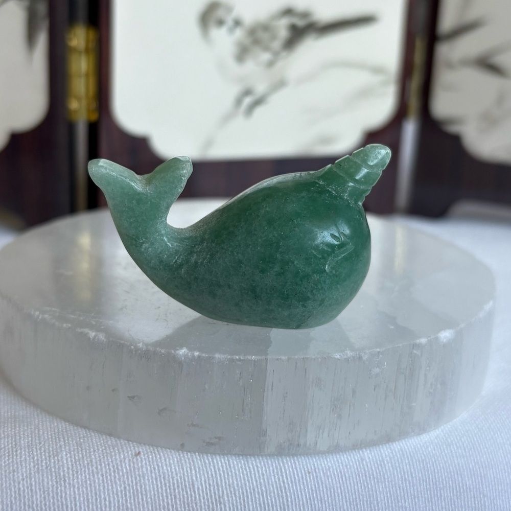 Green aventurine crystal narwhal carving